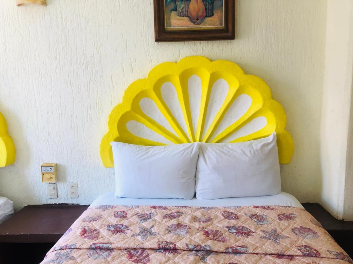 Hotel Playa Santa Cruz By Rotamundos Huatulco Extérieur photo