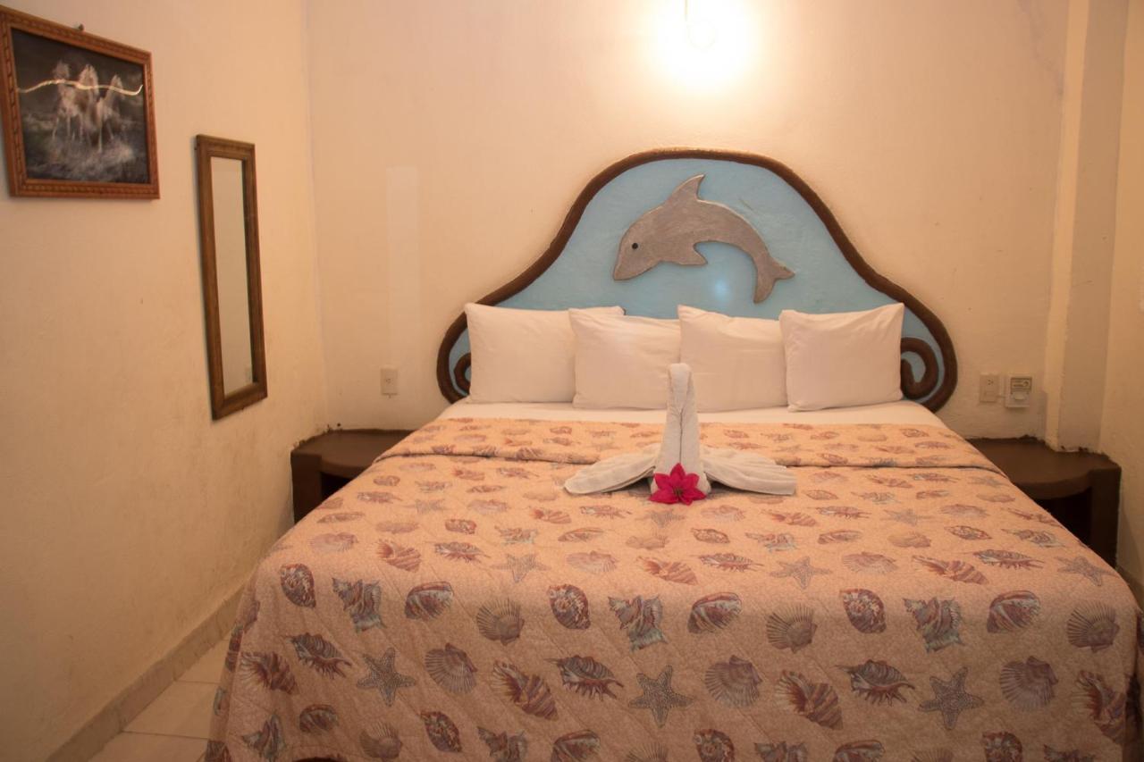 Hotel Playa Santa Cruz By Rotamundos Huatulco Extérieur photo